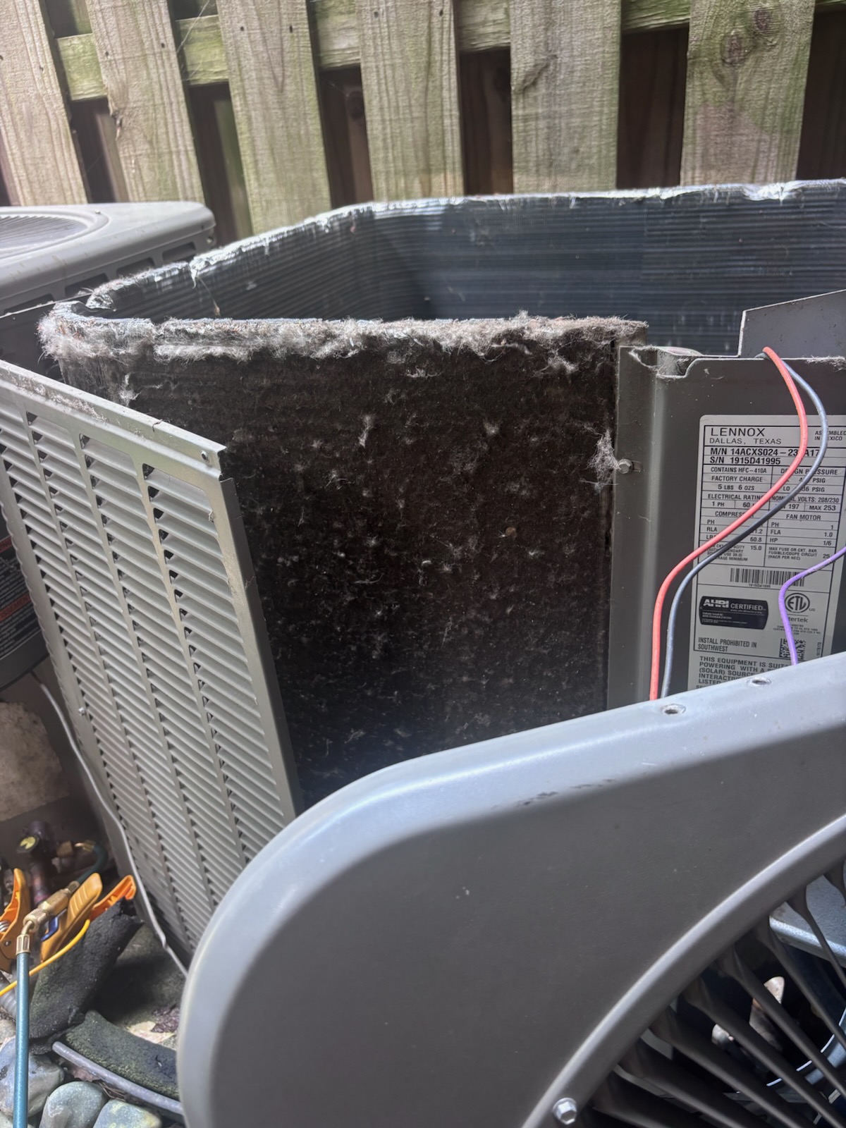 Outdoor air-conditioning condenser before cleaning